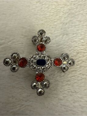 Vintage-Inspired Silver Cross Brooch with Red and Blue Stones